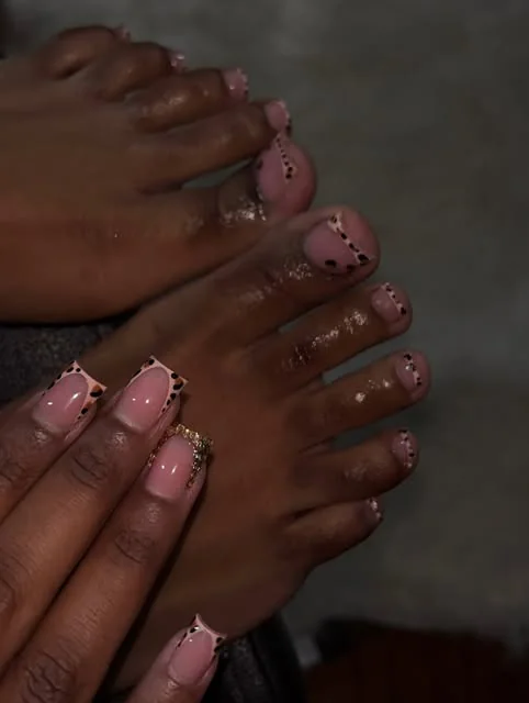Pink nail and toe set accented with small sparkling rhinestones.